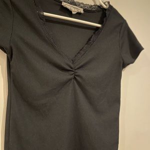 Black short sleeve shirt with lace